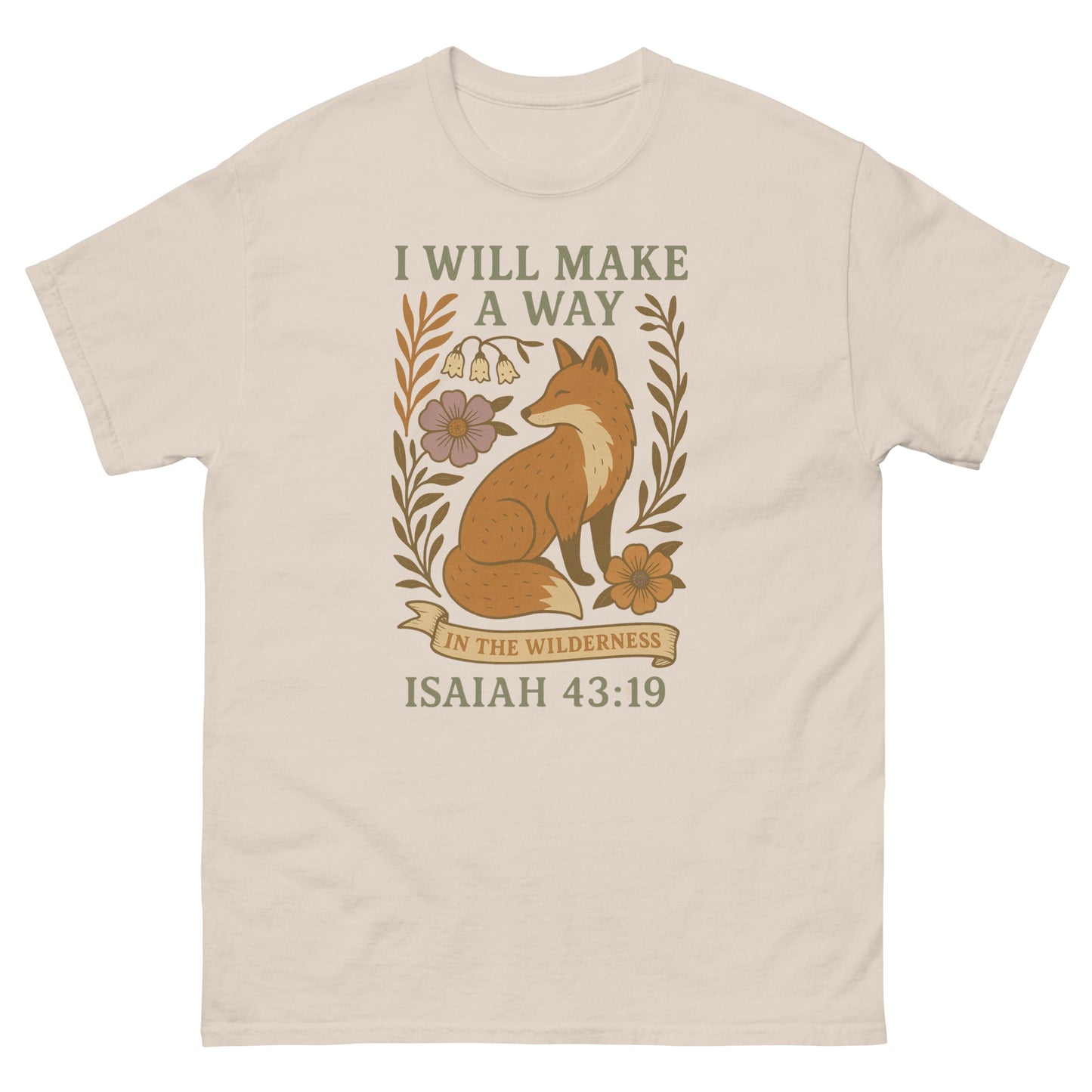 Christian T-shirt featuring a sitting fox surrounded by flowers and leaves, with the Bible verse 'I will make a way in the wilderness – Isaiah 43:19' in decorative text. Front, Natural Color