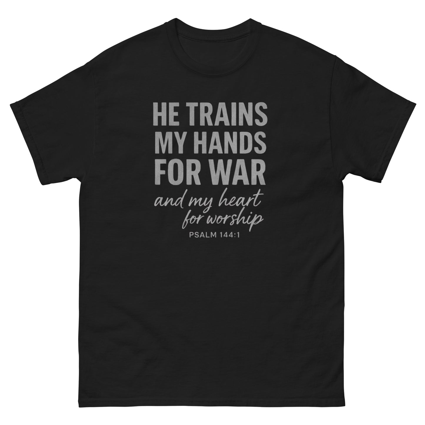 Front, Black t-shirt with bold white text reading “He trains my hands for war and my heart for worship – Psalm 144:1,” designed for faith-based wear.