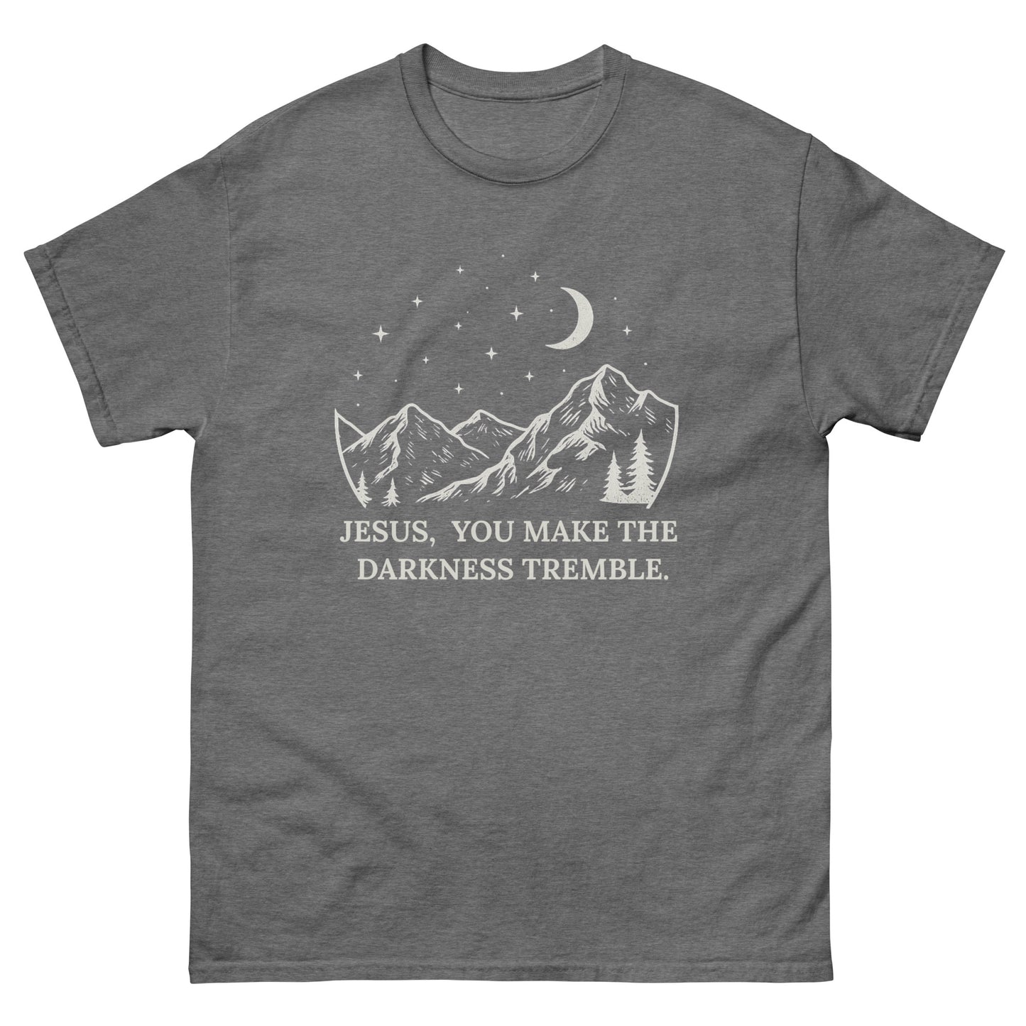 unisex T-shirt featuring a white line-art design of mountains, trees, crescent moon, and stars. Below the artwork, the text reads: "Jesus, You Make the Darkness Tremble." Front, Graphite Heather