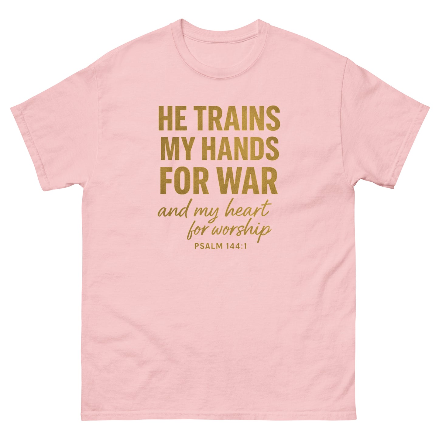 Front, Light Pink t-shirt with bold gold text reading “He trains my hands for war and my heart for worship – Psalm 144:1,” Christian faith apparel.