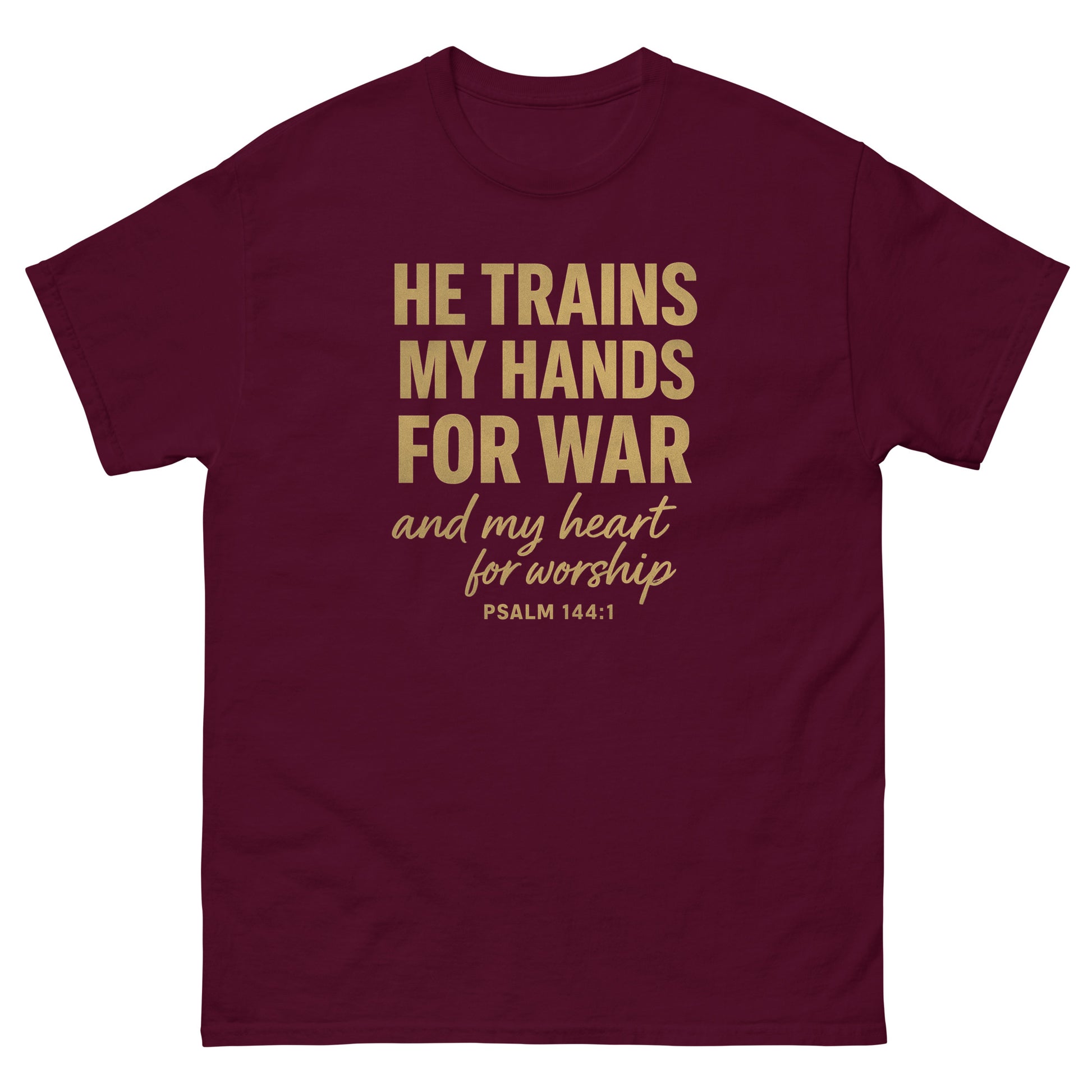 Front, maroon t-shirt with bold gold text reading “He trains my hands for war and my heart for worship – Psalm 144:1,” Christian faith apparel.