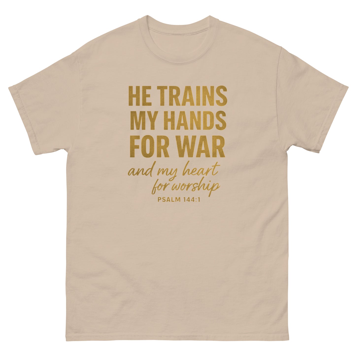 Front, Sand t-shirt with bold gold text reading “He trains my hands for war and my heart for worship – Psalm 144:1,” Christian faith apparel.