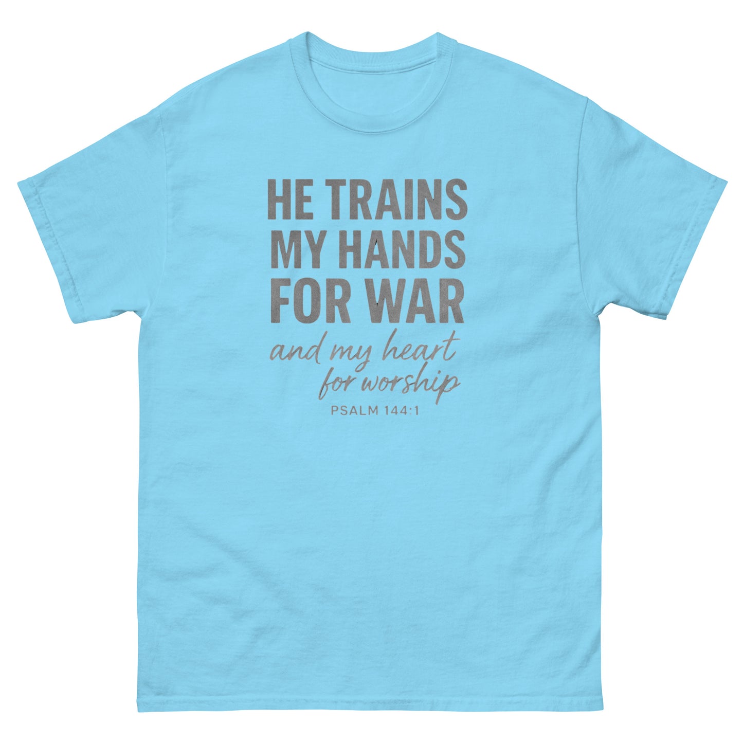Front, Sky Blue t-shirt with bold white text reading “He trains my hands for war and my heart for worship – Psalm 144:1,” designed for faith-based wear.