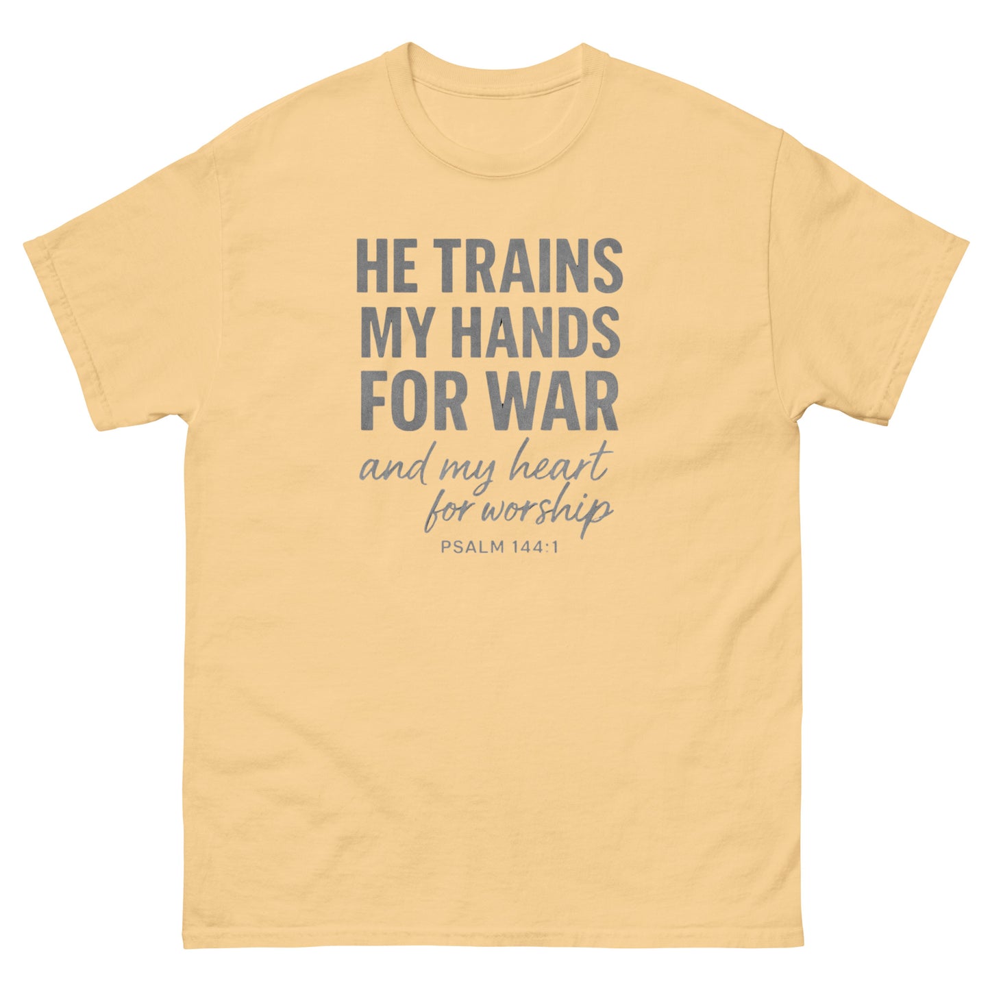 Front, yellow haze t-shirt with bold white text reading “He trains my hands for war and my heart for worship – Psalm 144:1,” designed for faith-based wear.